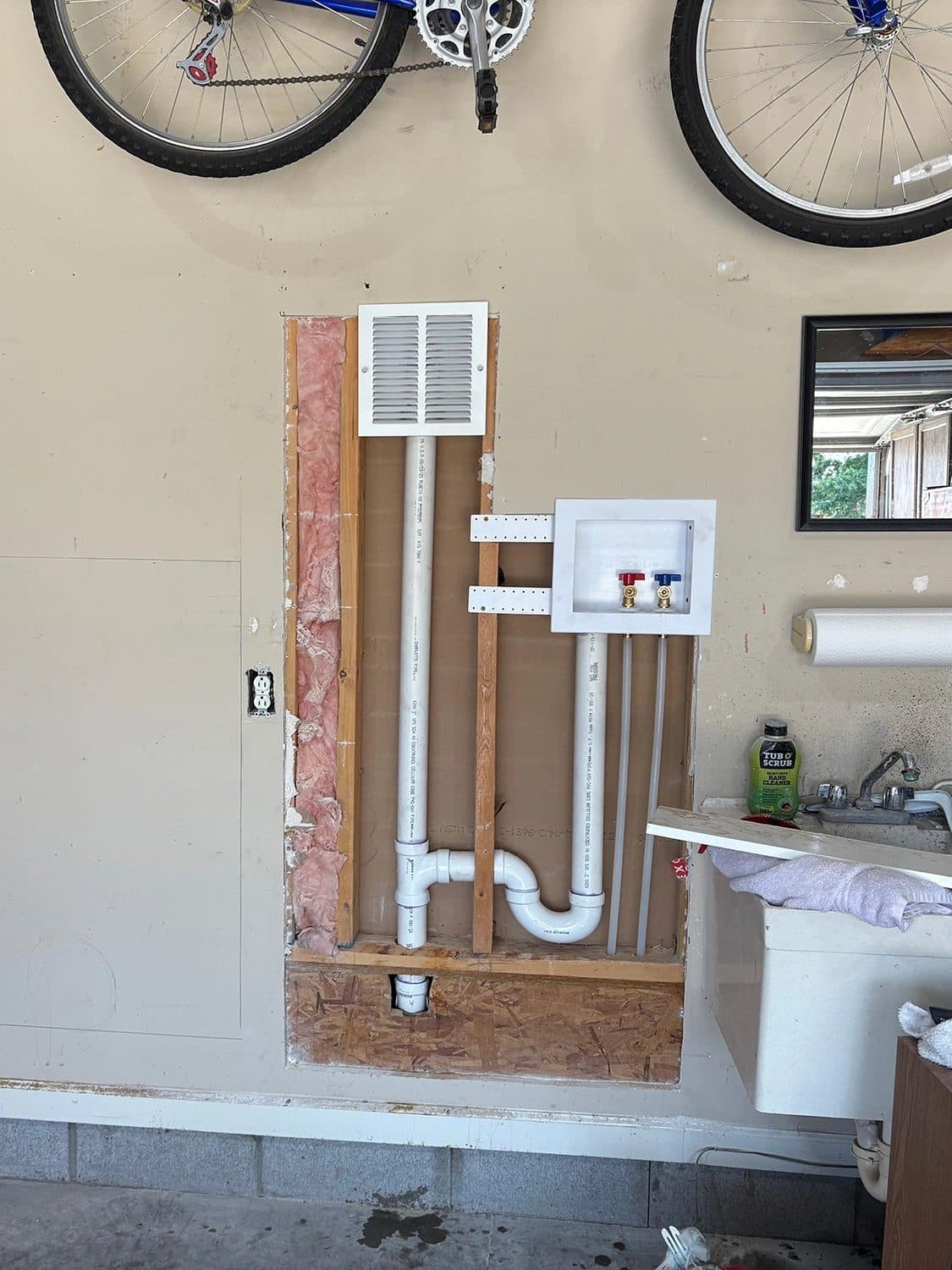 New washing machine drain and supply box roughed into a wall